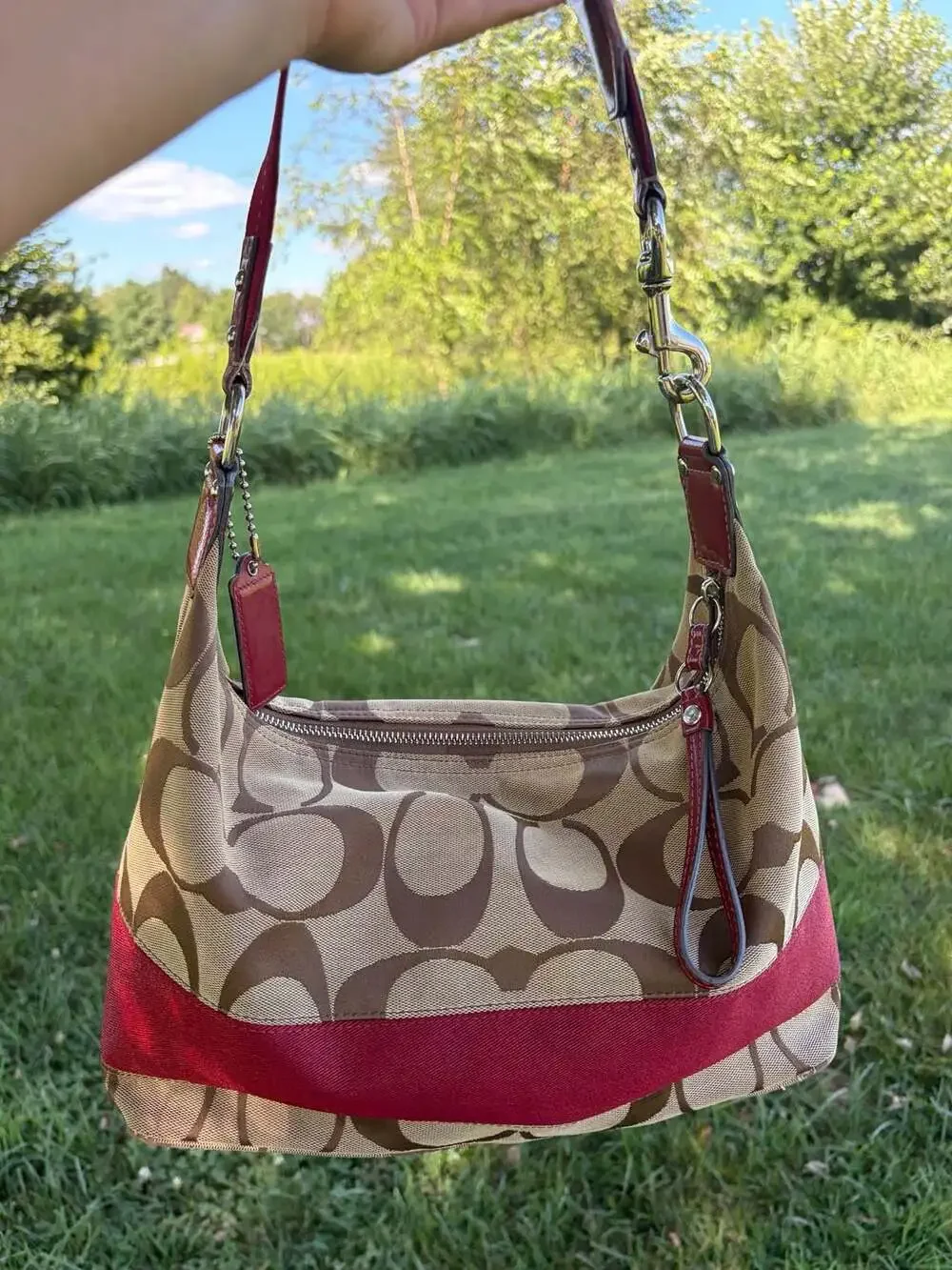 Coach signature stripe hobo bag in burgundy